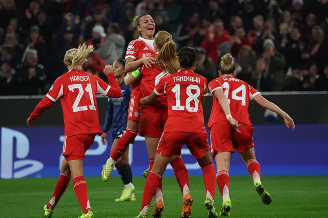 Bayern Munich's Icelandic defender #04 Glodis Viggosdottir (C) celebrates scoring the 3-2 goal