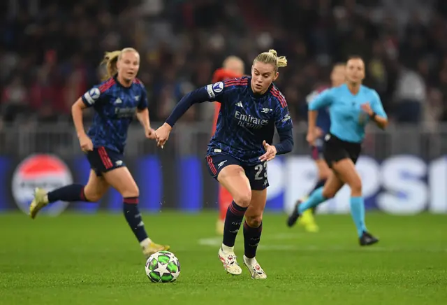 Alessia Russo of Arsenal controls the ball