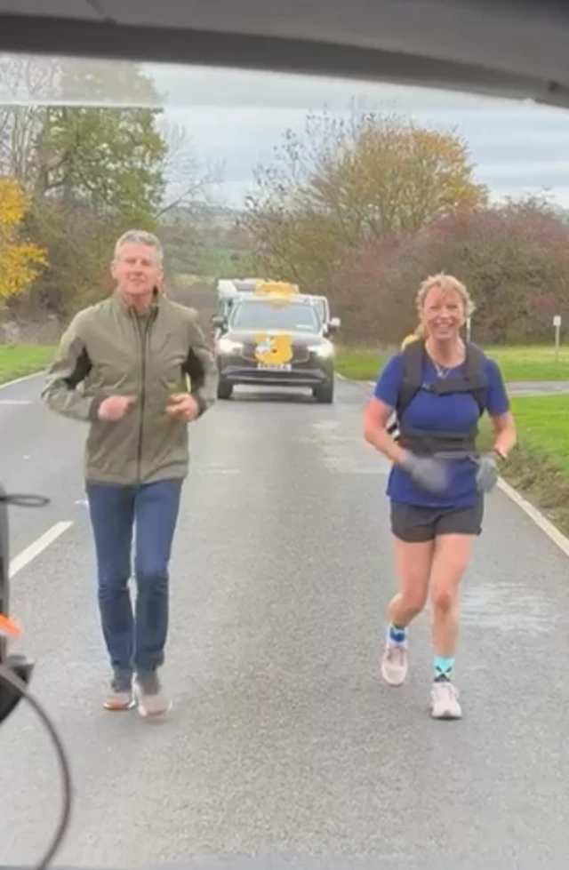 Steve Cram and Sara Cox run