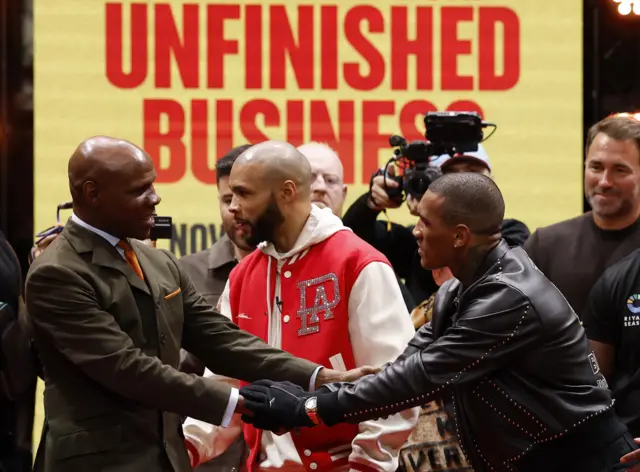 Chris Eubank Sr and Conor Benn shaking hands