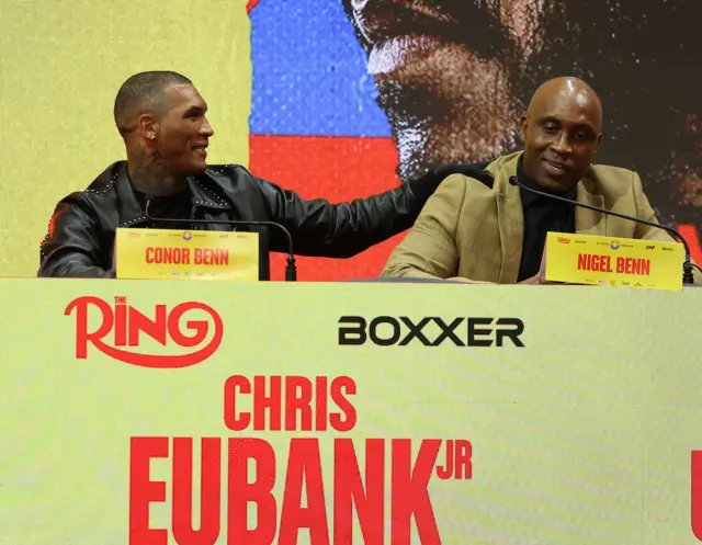 Conor Benn puts his arm on Nigel Benn's shoulder