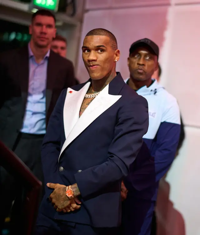 Conor Benn in a blue suit