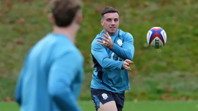 George Ford throws a pass in training