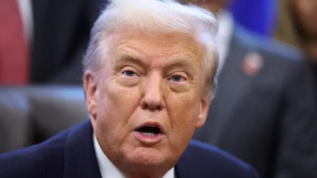 A close-up of US President Donald Trump speaking