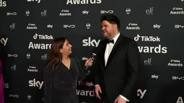 Yasmin Rufo asks questions to TikToker Morgan M-James in a tux