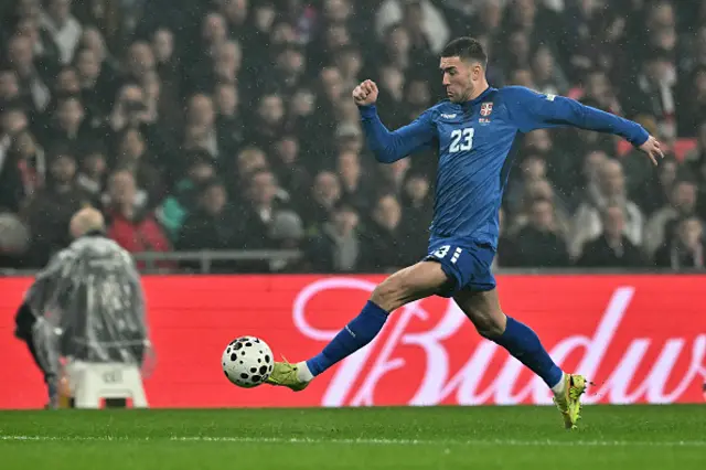 Serbia's forward Dusan Vlahovic runs with the ball