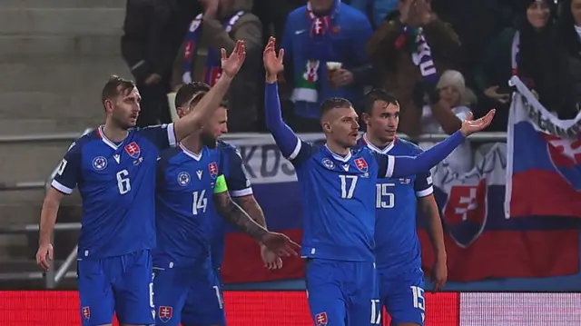Croatian players gesture to the referee