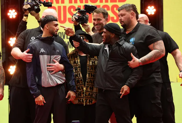 Adam Azim and Kurt Scoby facing off