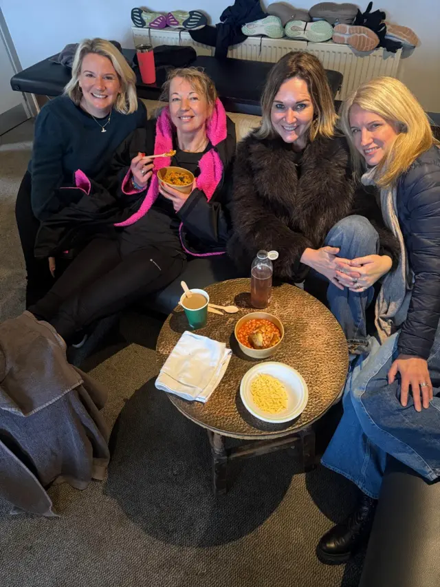 Sara smiles with her three best friends