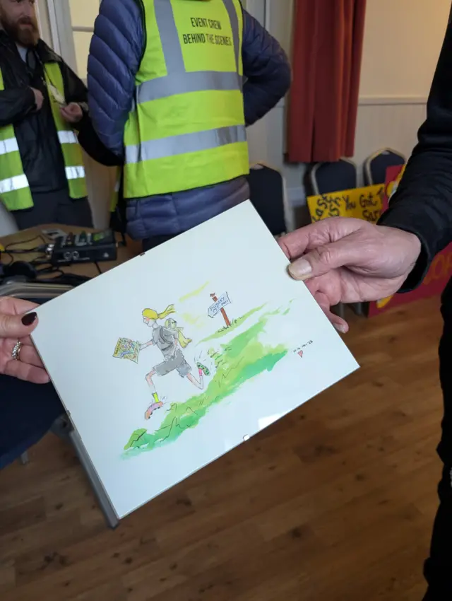 A drawing of Sara running