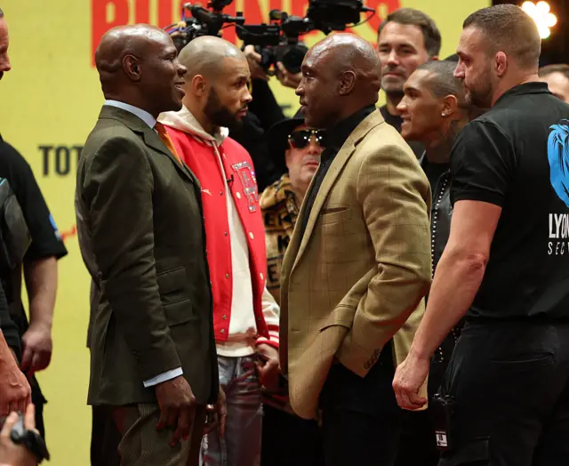 Chris Eubank Sr and Nigel Benn facing off at the news conference