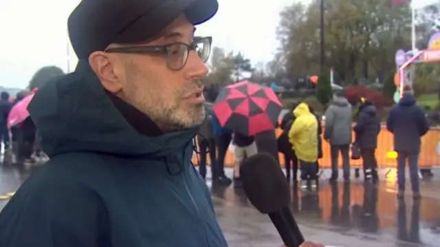 A man in a raincoat