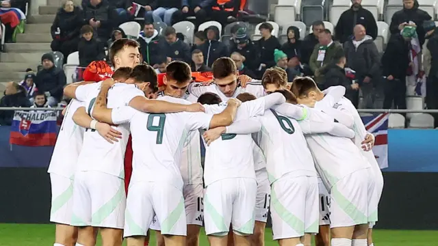 Northern Ireland players in a huddle