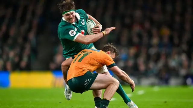 Ryan Baird is tackled by Harry Potter