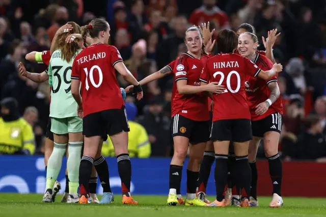 United players celebrate their win v PSG