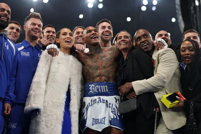 Conor Benn with his family and team posing for a picture