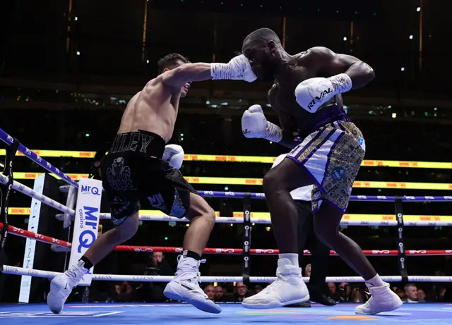 Jack Catterall punches Ekow Essuman