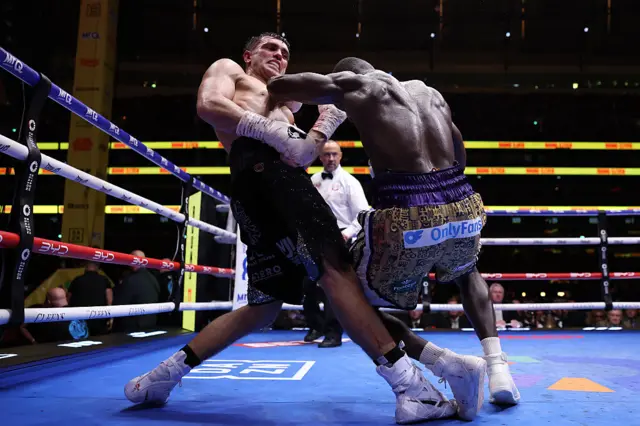 Jack Catterall and Ekow Essuman exchange punches