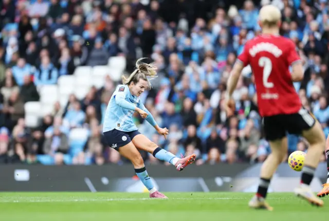 Lauren Hemp scores