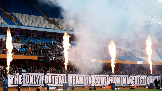 A banner reading 'the only team to come from Manchester'