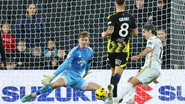 Callum Paterson scores MK Dons' second goal against Salford