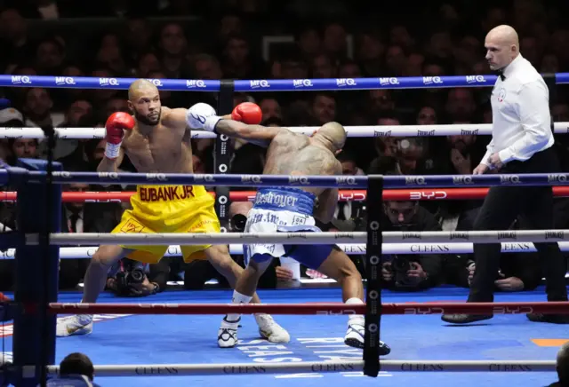 Conor Benn throws at Chris Eubank