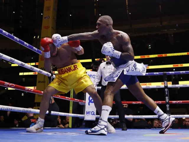 Benn lands an overhand on Eubank