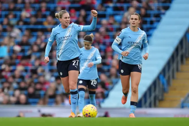 Rebecca Knaak celebrates