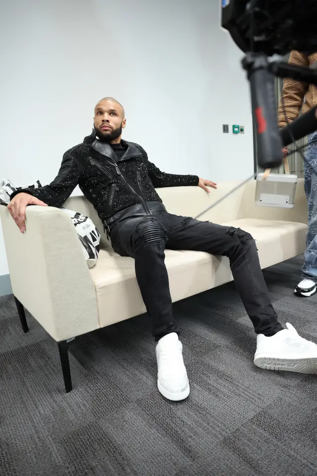 Chris Eubank Jr relaxes in his dressing room
