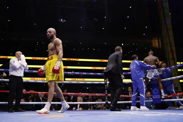 Conor Benn celebrates as Chris Eubank Jr walks away