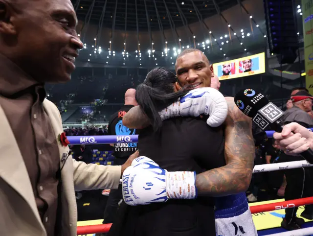 Conor Benn hugs his mother in the ring