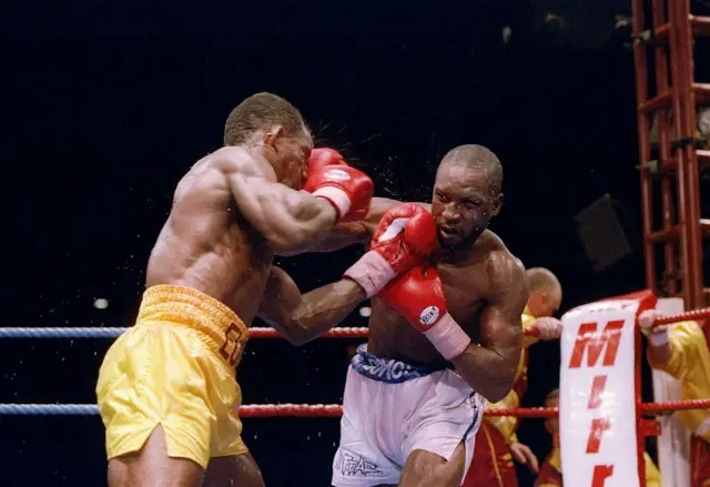 Chris Eubank Sr and Nigel Benn trading punches