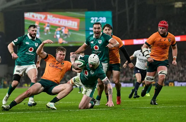 Mack Hansen scores his third try