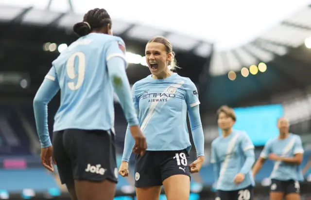 Khadija Shaw and Kerstin Casparij celebrate