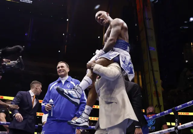 Conor Benn is on his father's shoulders