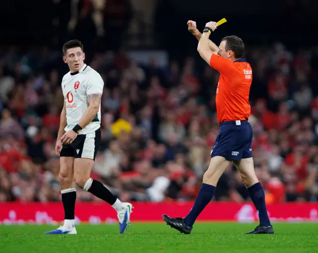 Josh Adams is shown a yellow card