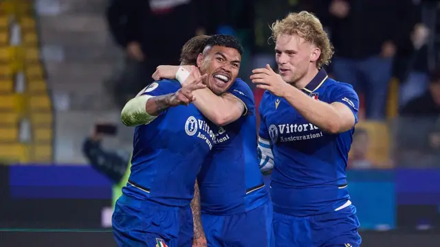 Louis Lynagh and Monty Ioane celebrate for Italy