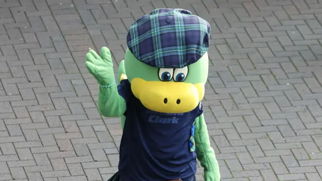 Scottish mascot waves to crowds