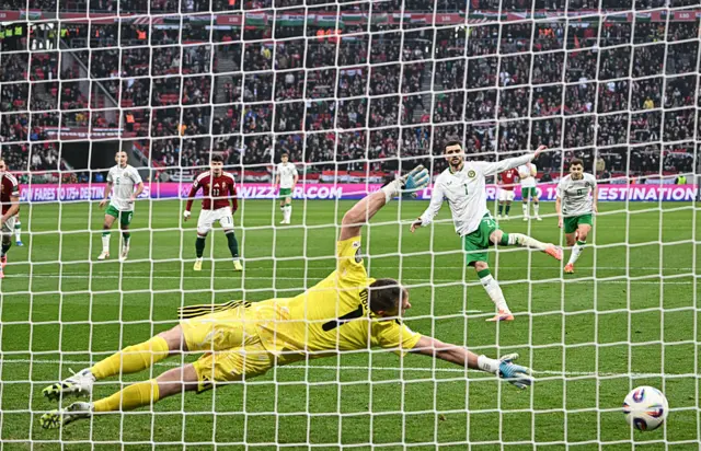 Troy Parrott scores the penalty against Hungary during the World Cup Group F qualifier