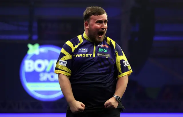 Luke Littler celebrating