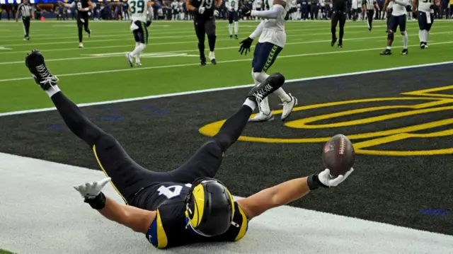 Los Angeles Rams tight end Colby Parkinson scores a touchdown against the Seattle Seahawks