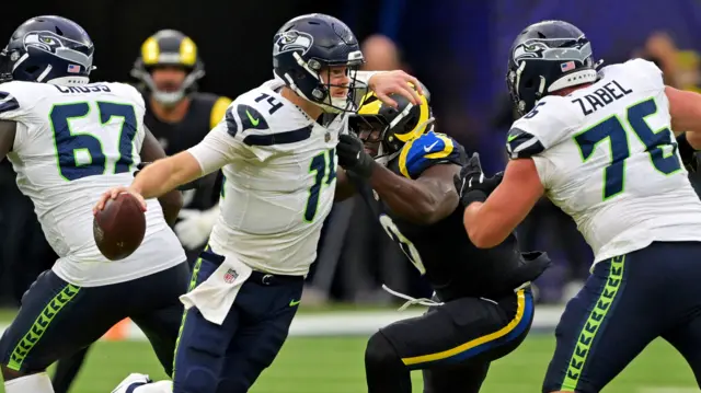 Seattle Seahawks quarterback Sam Darnold runs the ball against the Los Angeles Rams