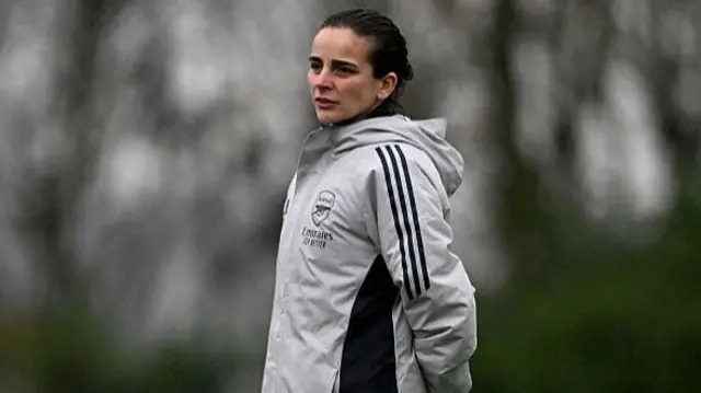Renee Slegers watches Arsenal training