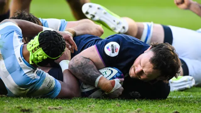 Ewan Ashman scores a try for Scotland against Argentina