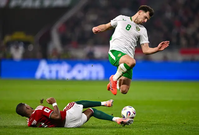 Jayson Molumby is tackled by Loic Nego of Hungary