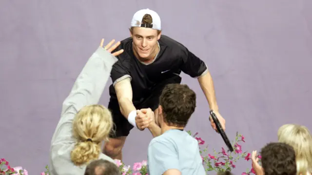 Lleyton Hewitt celebrates with spectators after winning the 2001 Tennis Masters Cup