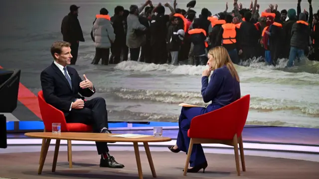 Chris Philp and Laura Kuenssberg.