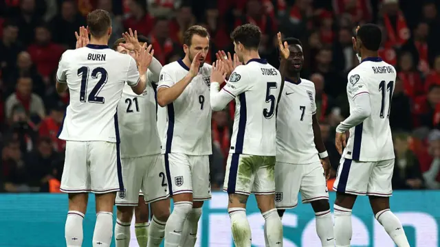 England players celebrate after Harry Kane's goal against Albania.
