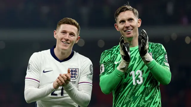 Elliot Anderson and Dean Henderson applauding.