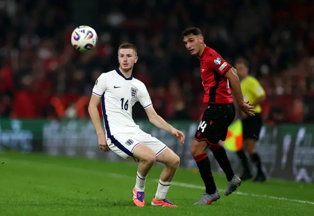Adam Wharton of England and Qazim Laci of Albania battle for possession